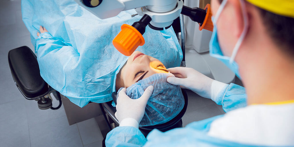 Woman having eye surgery