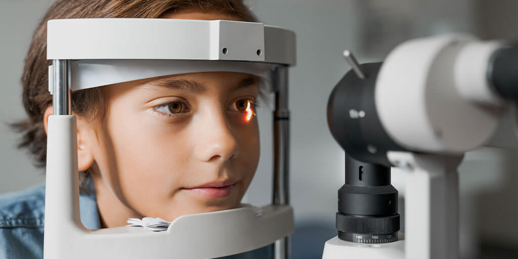 Young boy getting his eyes checked